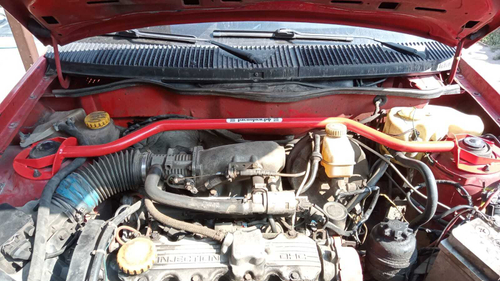 Распорка передних стоек (цельная) Daewoo Nexia и Opel Kadett E (с квадратным фильтром) и Opel Astra F (ПОД ЗАКАЗ)