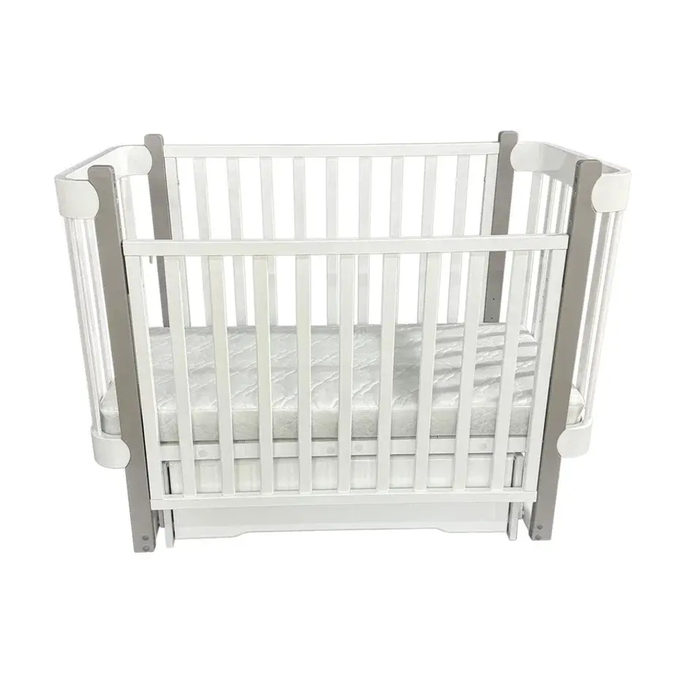 Детская кроватка Solnyshko с ящиком (поперечный маятник, съемная стенка, колеса)