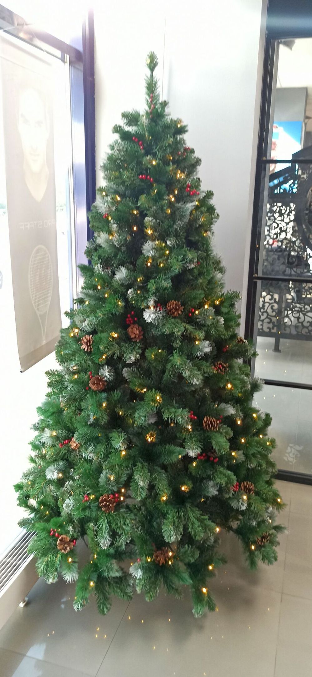 Заснеженная елка с гирляндой «Очарование» с шишками и ягодами (Леска+пвх) 180 см / 1.8 м