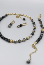 Колье асимметричное с кошачим глазом и кубиками Swarovski, оттенок золото