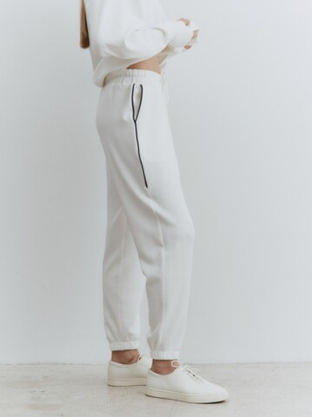 Джоггеры с кантом, цвет молочный