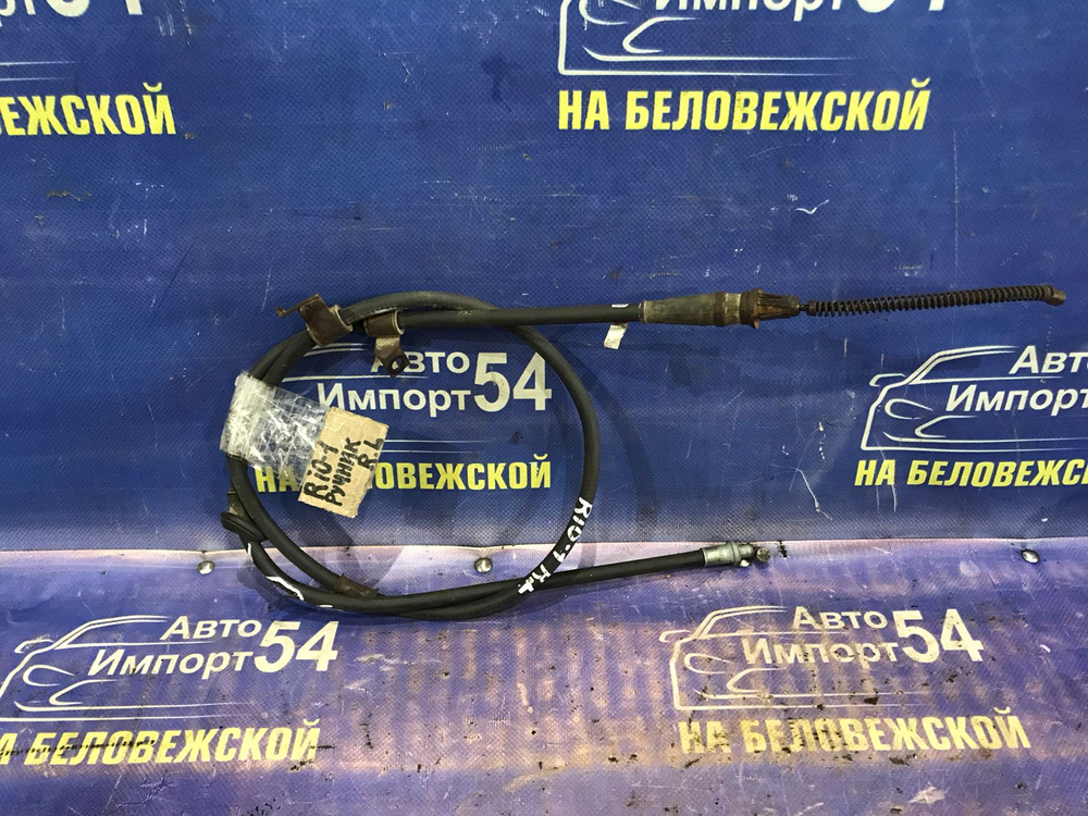 Трос ручника левый Kia RIO 2004