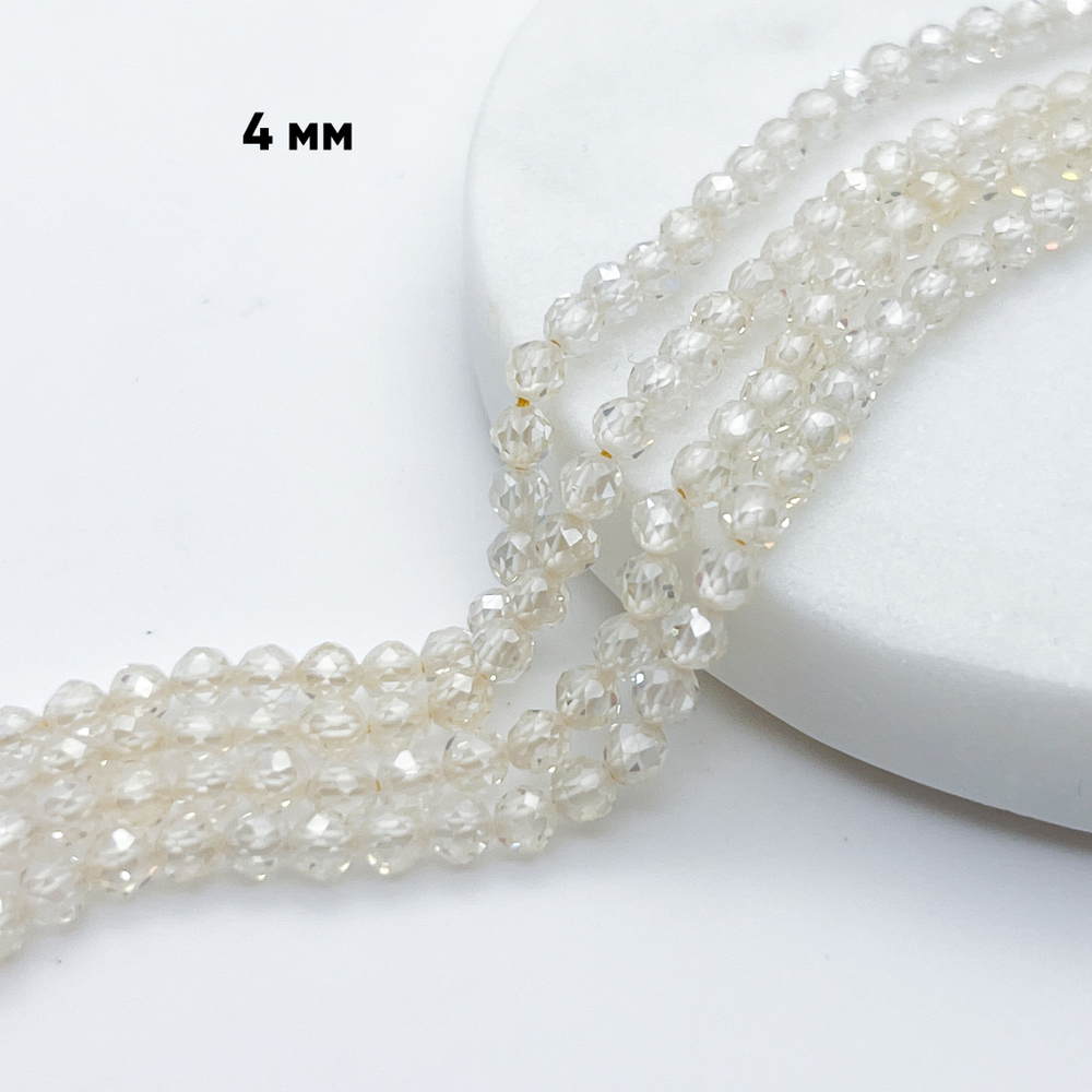 Фианит (кубический цирконий), цвет бледно-желтый, размер 4 мм, цена за отрезок 19 см (1/2 нити)