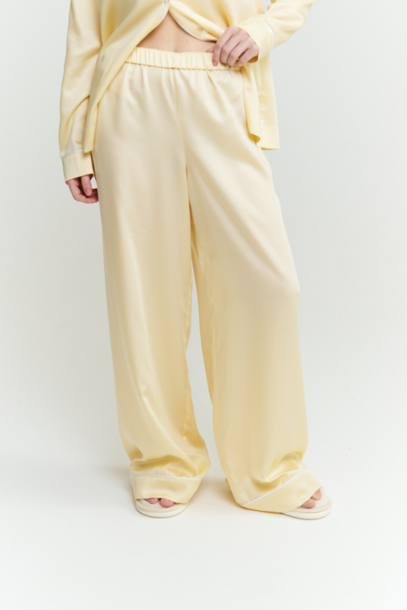 Брюки из тенселя с кантом лимонные