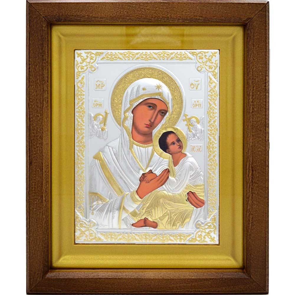 Икона Страстная Божией Матери в серебряном окладе, в деревянном киоте.