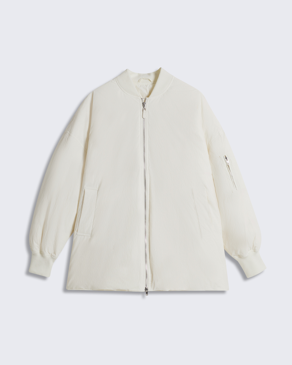 Бомбер на пуху молочный