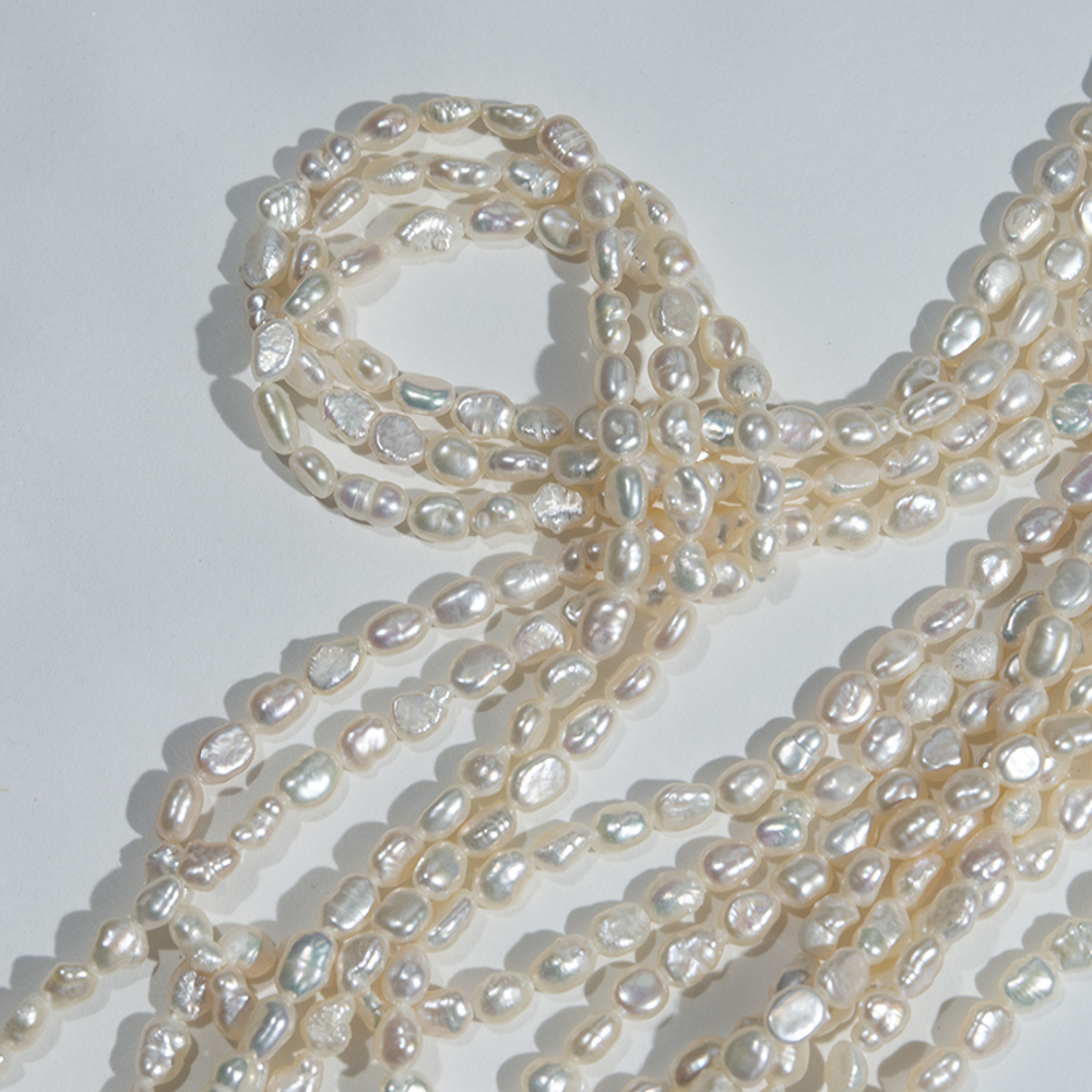Жемчуг культивированный фриформ A Grade, белый, 3,5*5мм
