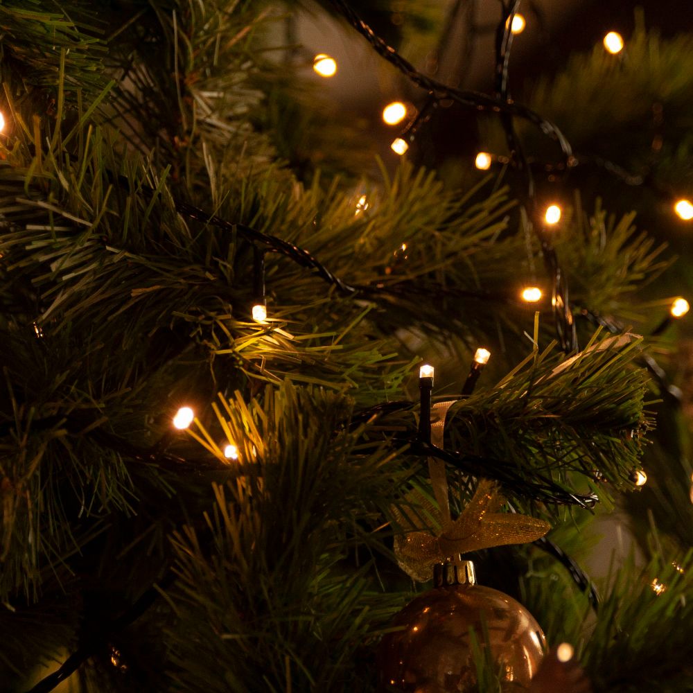 ULD-S5000-500-DGA WARM WHITE IP20 Гирлянда светодиодная. 50м. 500 светодиодов. Теплый белый свет. Провод зеленый. ТМ Uniel