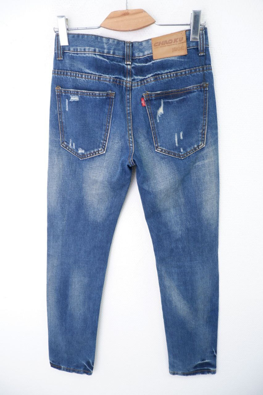 Джинсы с рваным эффектом 44 размер