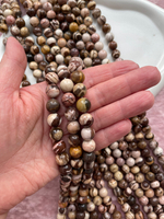 Нить бусин из яшмы 10,5мм