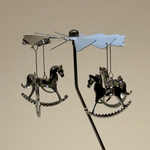 Подсвечник-карусель "Лошадки-качалки"