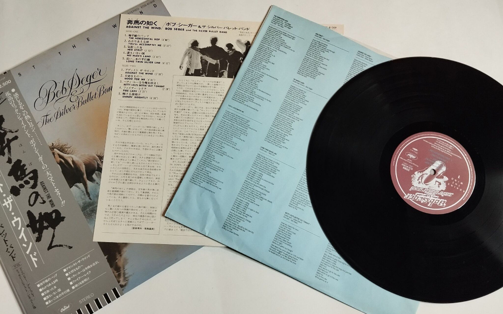 Винтажная виниловая пластинка LP Bob Seger and The Silver Bullet Band Against The Wind (Japan 1980) (Obi)