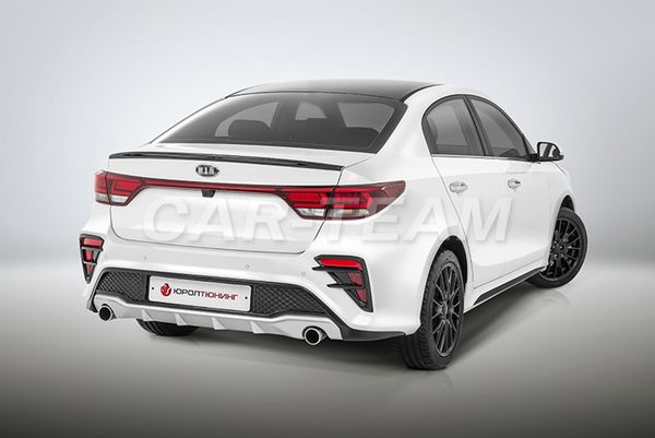 Бампер задний на Kia Rio IV "ЮролТюнинг" Kudos под раздвоенный глушитель, окрашенный в цвет