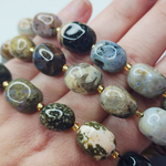 Океаническая яшма, риолит, крупная галтовка, 12-15 мм, овалы, цена за нить 12.5 - 13 см (1/3 нити)