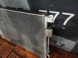 Радиатор кондиционера Solaris 1 / Rio 3 Б/У Оригинал 976061R000