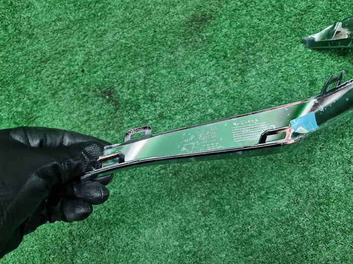 Молдинг заднего бампера левый Geely Monjaro 21-нв