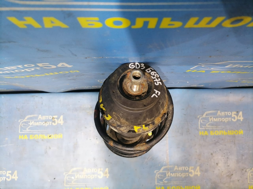 Стойка передняя левая Honda FIT 2001-2007