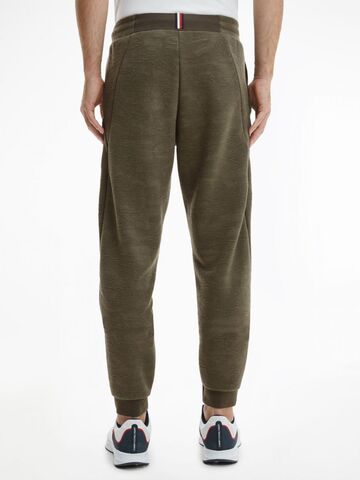Мужские теннисные штаны Tommy Hilfiger Comfort Capsule Pant - зеленый