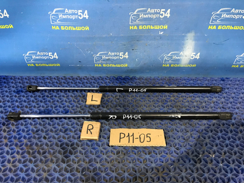 Амортизатор задней двери левый NISSAN PRIMERA 1999