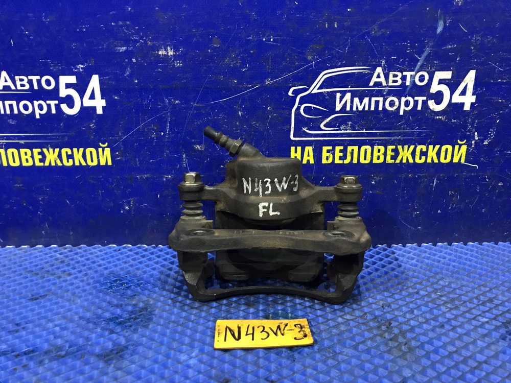 Суппорт тормозной передний левый MITSUBISHI CHARIOT 1994