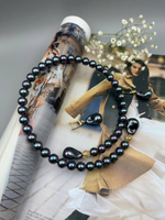 Серьги из "бензиновых" барочных жемчужин каплевидной формы на английском замке, оттенок золото