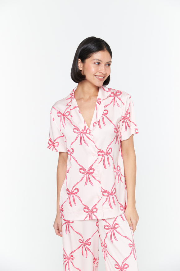 Шелковая блуза с бантами