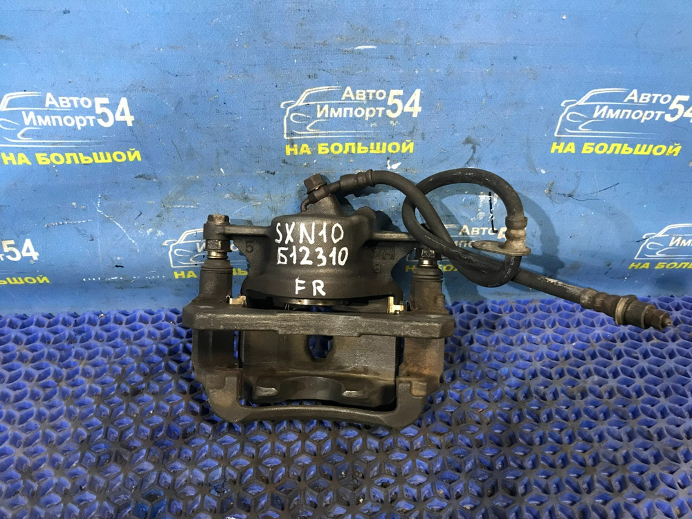 Суппорт тормозной передний правый TOYOTA IPSUM 1996-2001