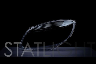 Правое стекло фары Skoda Fabia II 2007-2010