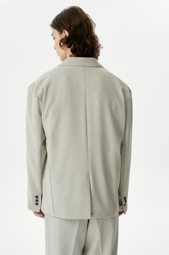 Бежево-серый брючный костюм Copper