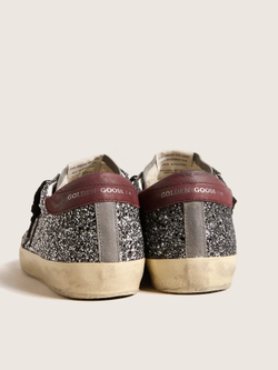 Super-Star in glitter with black star and burgundy heel tab
