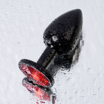 Черная анальная пробка 7,2см с кристаллом красного цвета ToyFa Metal 717007-59