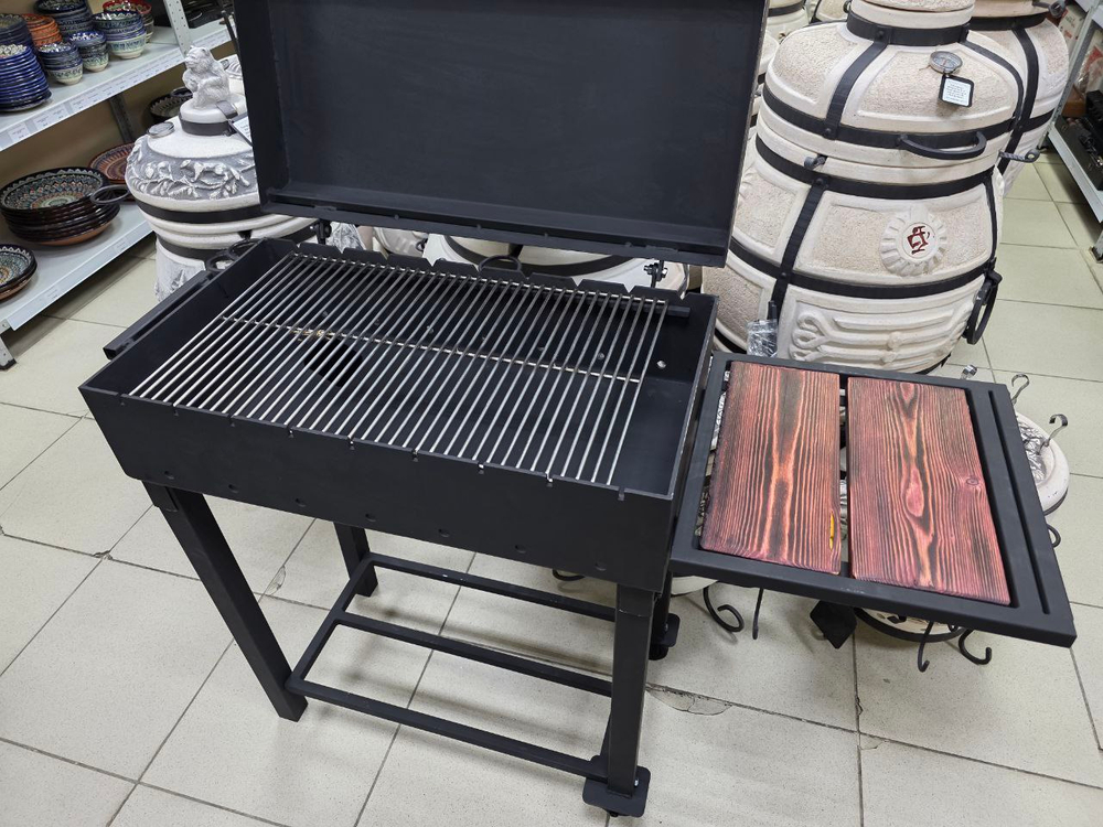 Если вы хотите мангал купить в Казани и ищете мангал 5 мм, обратите внимание на мангал Пикник Лофт Классика: это мангал в наличии Казань, качественный мангал от производителя, удобный мангал на колесах, практичный мангал с полкой и мангал с дровницей. Такая модель подходит как мангал для дачи, мангал для дома и мангал для беседки, а по размеру жаровни это отличный мангал для шашлыка, мангал для мяса, мангал для овощей и мангал под решетку. У нас можно сразу доукомплектовать комплект: решетка для мангала из нержавейки, решетка гриль для мангала, решетка из нержавеющей стали 5 мм, шампуры купить в Казани, совок и кочерга, а также выбрать казан купить в Казани под ваши задачи — казан чугунный или казан афганский, плюс вставка под казан/место под казан для мангала. Если нужна доставка, доступна доставка мангала по Казани и мангал с доставкой в Казани, а также отправка по России транспортной компанией; приезжайте в магазин в Казани и выбирайте из наличия, потому что у нас большой ассортимент и более 25 моделей мангалов в наличии, включая мангалы из стали 5 мм, мангальные зоны, мангальные зоны с крышей, печи под казан и печи 5 мм.