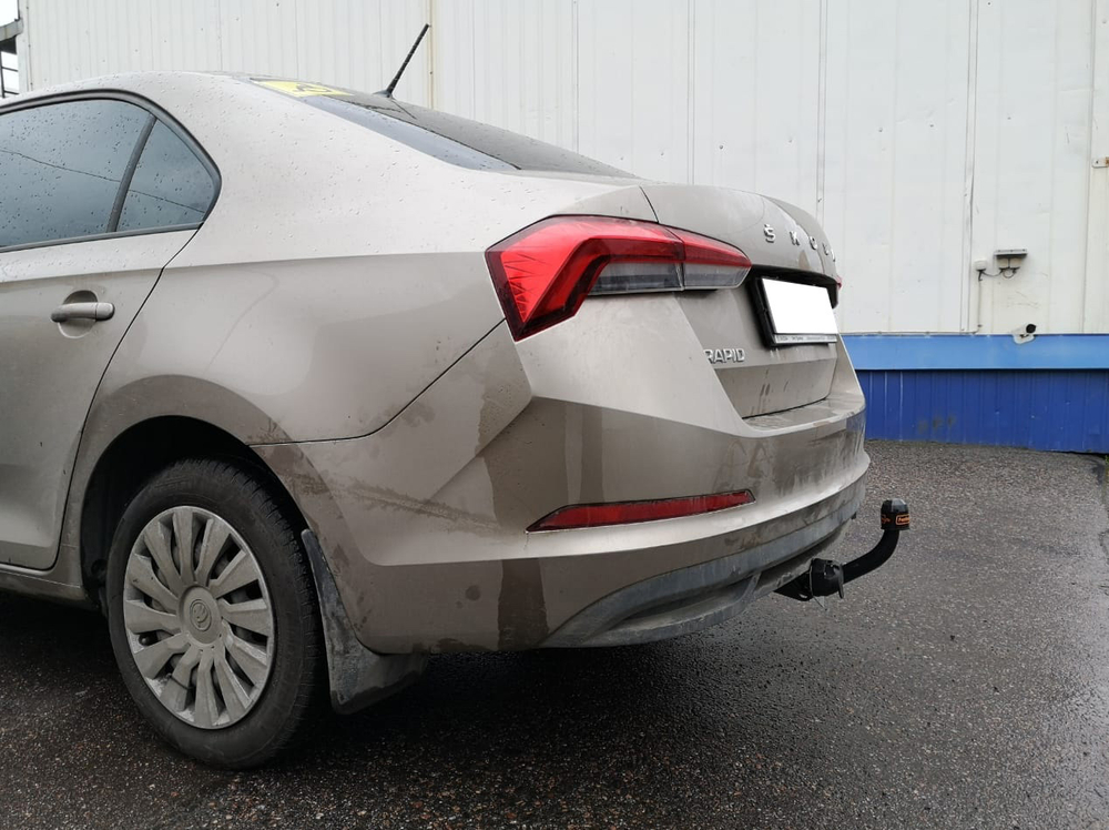 Фаркоп Трейлер 9740 на Skoda Rapid (а/м с 2014г.в.5dr.) лифтбек 2012г.-(паспорт и сертификат в комплекте)(без электрики)