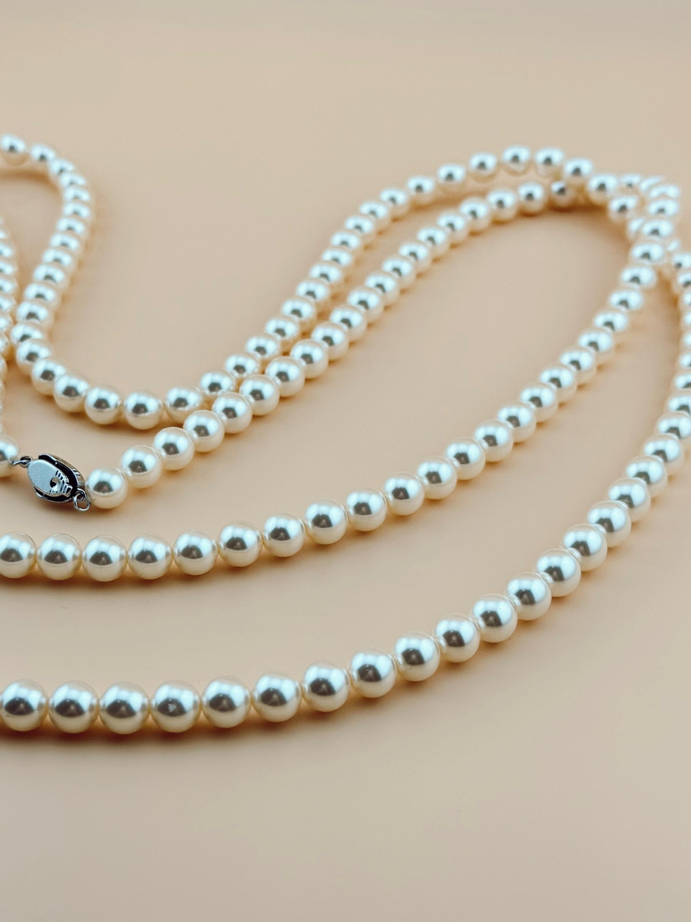 Длинное колье из жемчуга