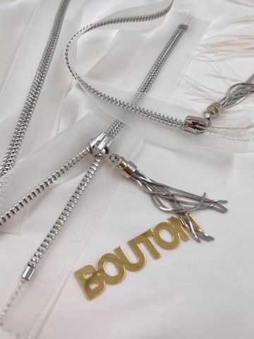 Молния на прозрачной сетке (основе) серебристая с кистью широкая