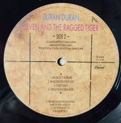 Винтажная виниловая пластинка LP Duran Duran Seven And The Ragged Tiger (USA 1983)
