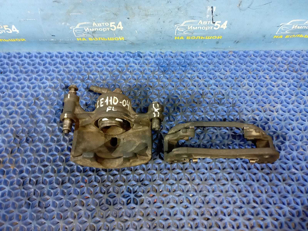 Суппорт тормозной передний левый TOYOTA COROLLA 1996