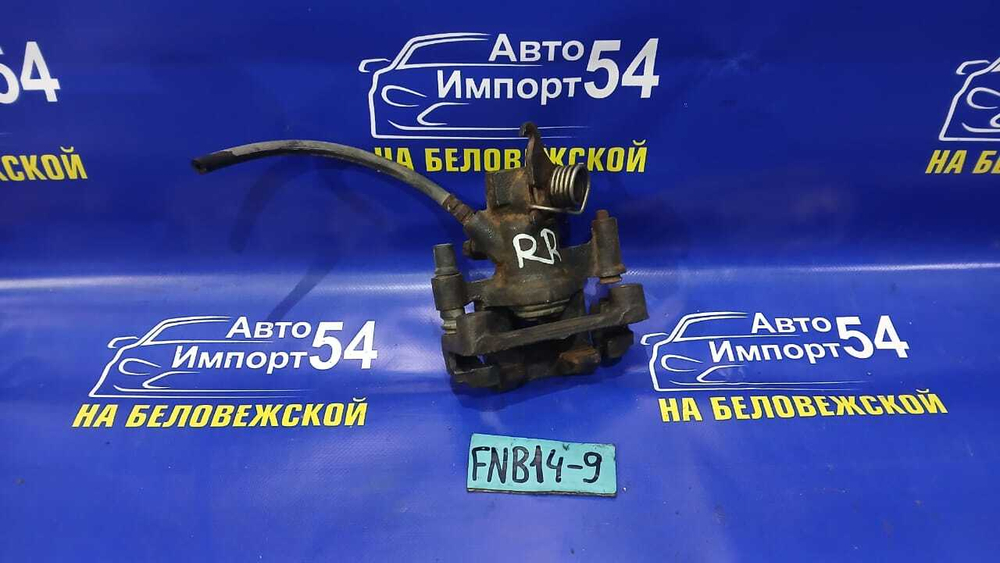 Суппорт тормозной задний правый NISSAN SUNNY 1997