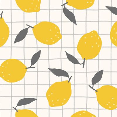 Желтые лимоны на белой клетке. Маленькие