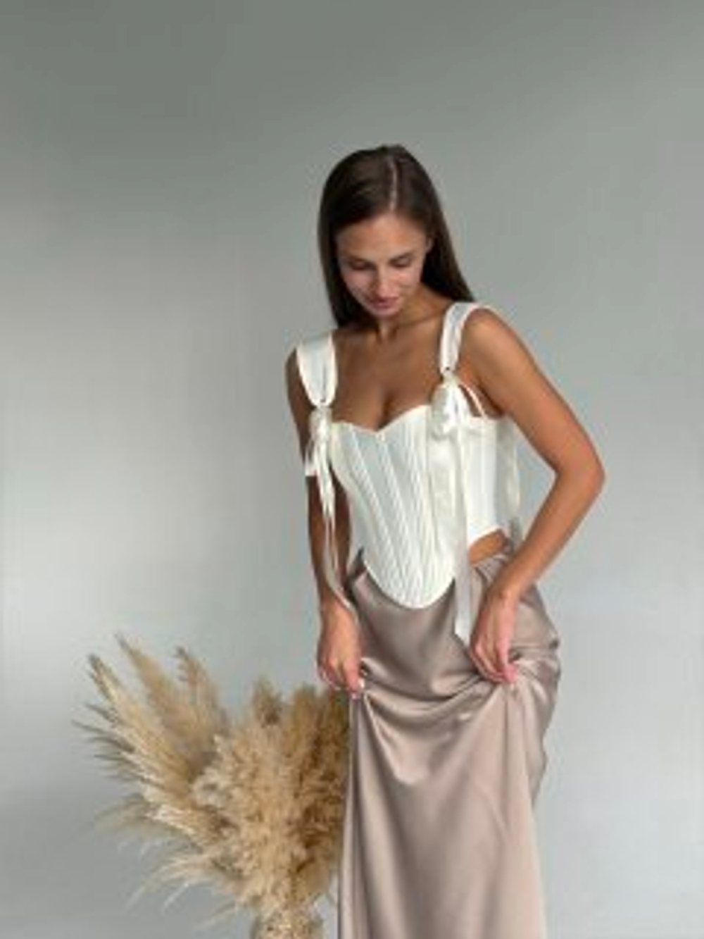 Корсет с бантами в молочном цвете