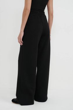 Утепленные брюки клеш черного цвета