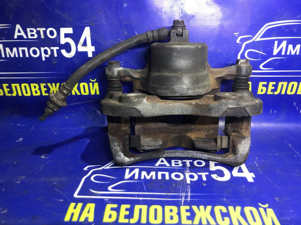 Суппорт тормозной передний правый NISSAN SERENA 1998