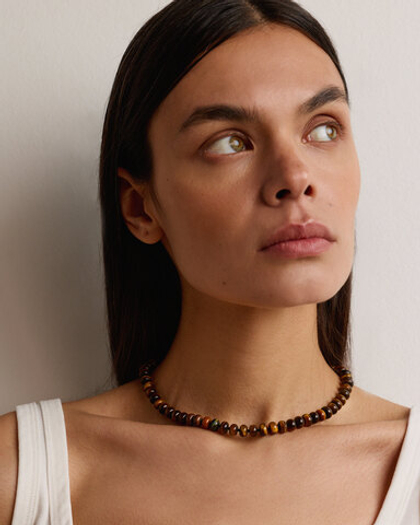 Нить из тигрового глаза