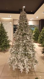 Заснеженная елка с гирляндой «Форесто» холодный свет (Литая+пвх) от 1.2 до 2.4 м