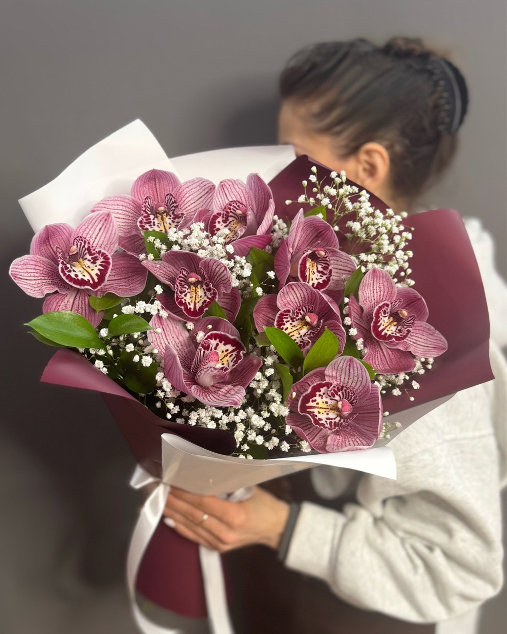 Букет из 9 розовых орхидей
