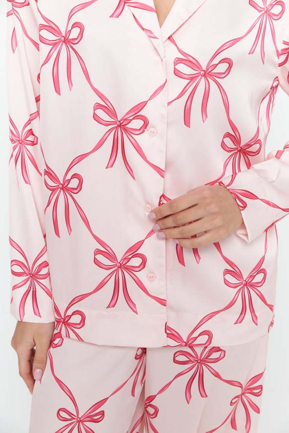 Шелковая блуза с бантами