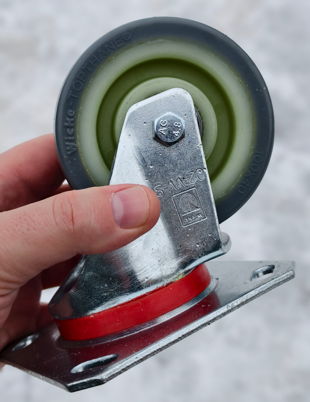 Колесо опорное (ролик) 1212422 Tennant T300 T500 (оригинал)