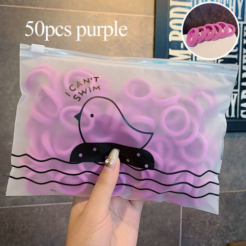 Набор резинок для волос в косметичке 50 шт. Цвет сиреневый.