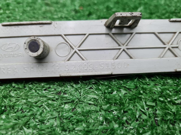 Катафот центральный Hyundai Santa Fe 4 TM (20-24)