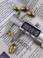 Пуговицы золотые овальные